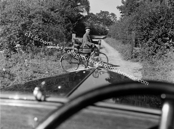 ROADSIDE SCENE  CYCLIST THROUGH WINDSCREEN